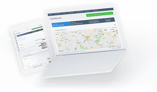 A white laptop and tablet displaying Field Groove's dashboard with a map.